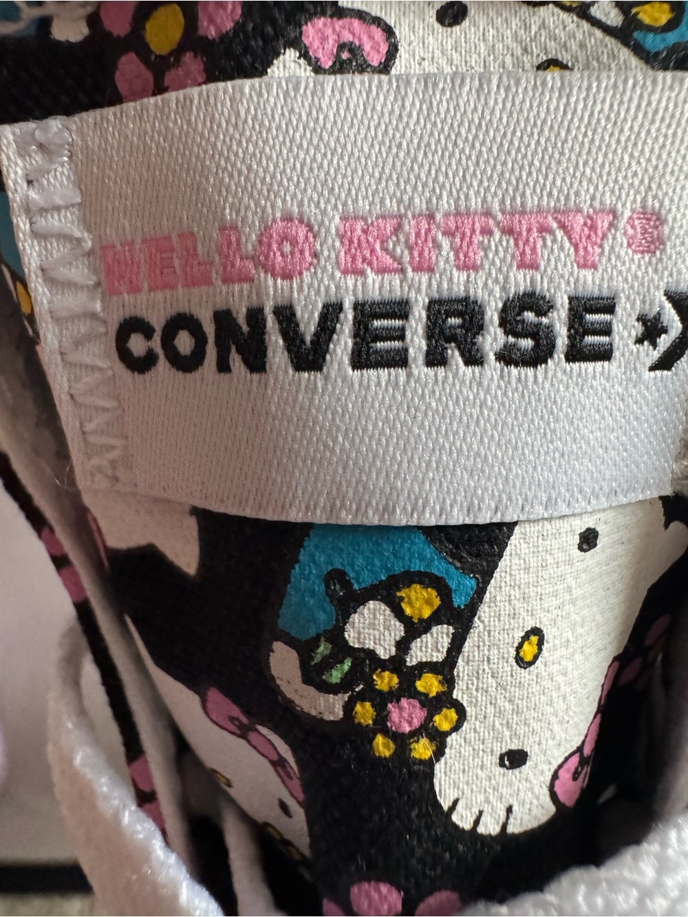 Converse Black Hello Kitty Floral Low-Top Sneakers with Pink & Blue Accents - Picture 9 of 11